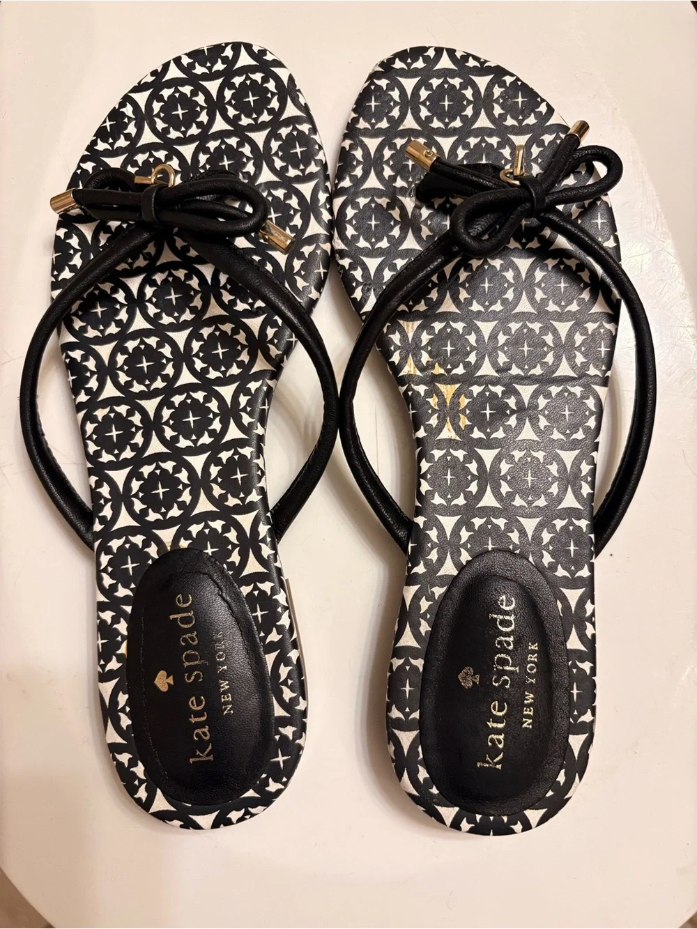 kate spade Black & White Patterned Bow Sandals with Gold Accents